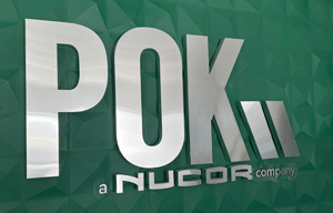 Nucor/POK sign